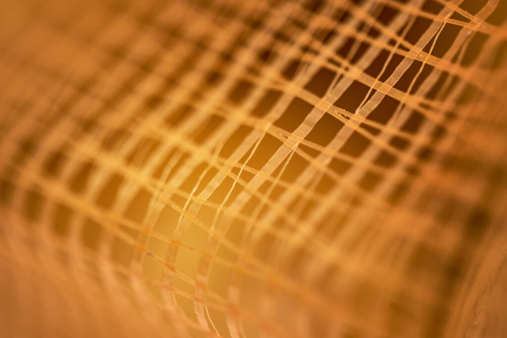 Orangefarbenes Solipac Flachnetz – atmungsaktiv für Kartoffeln und Agrarprodukte – close up.